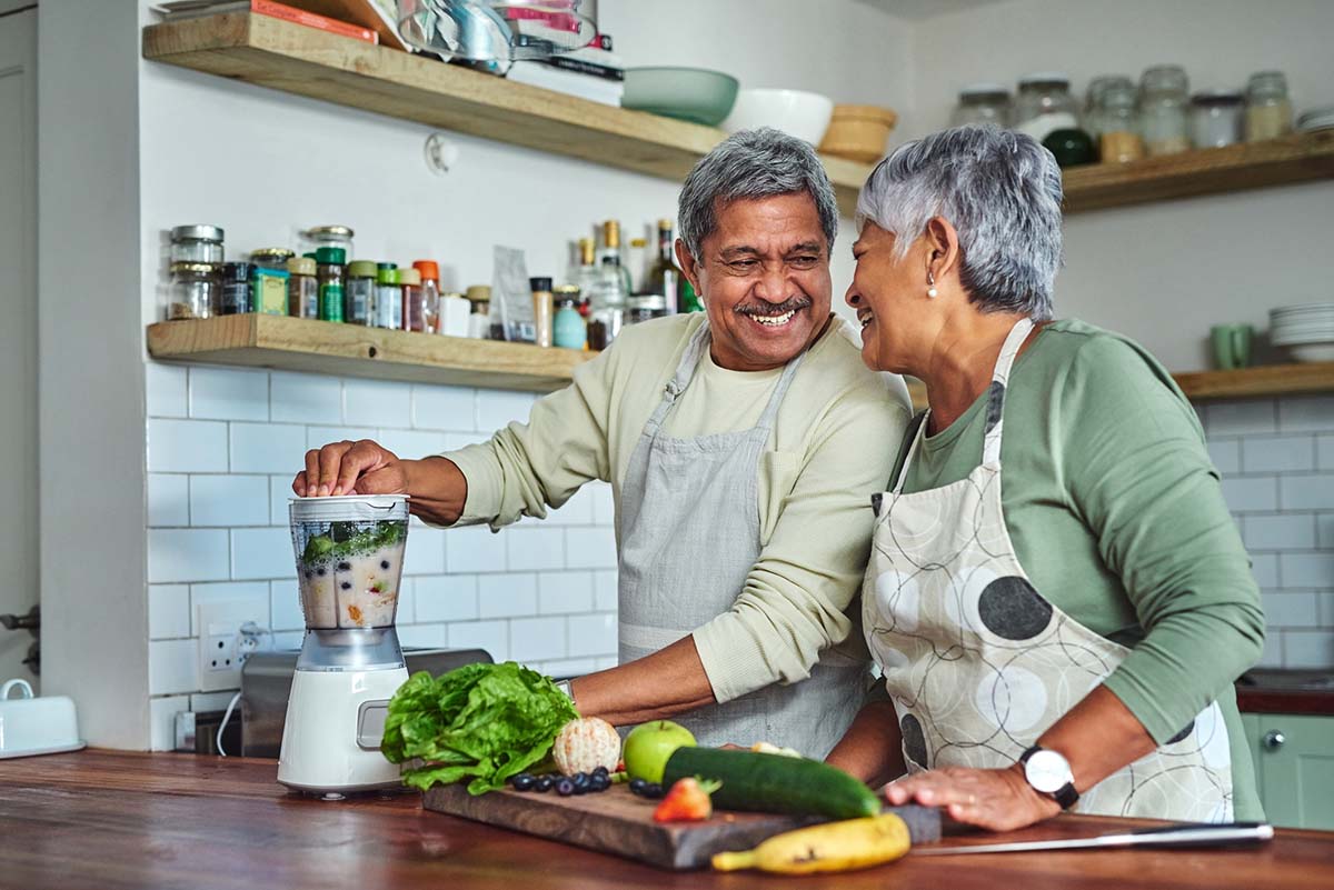 Couple preparing food together